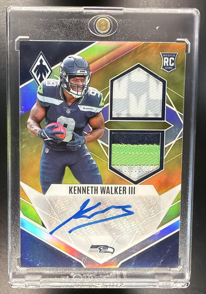 2022 Panini Phoenix Kenneth Walker III #RAD-KW RPS Rookie Auto Dual Jersey Prime Yellow /75 RC